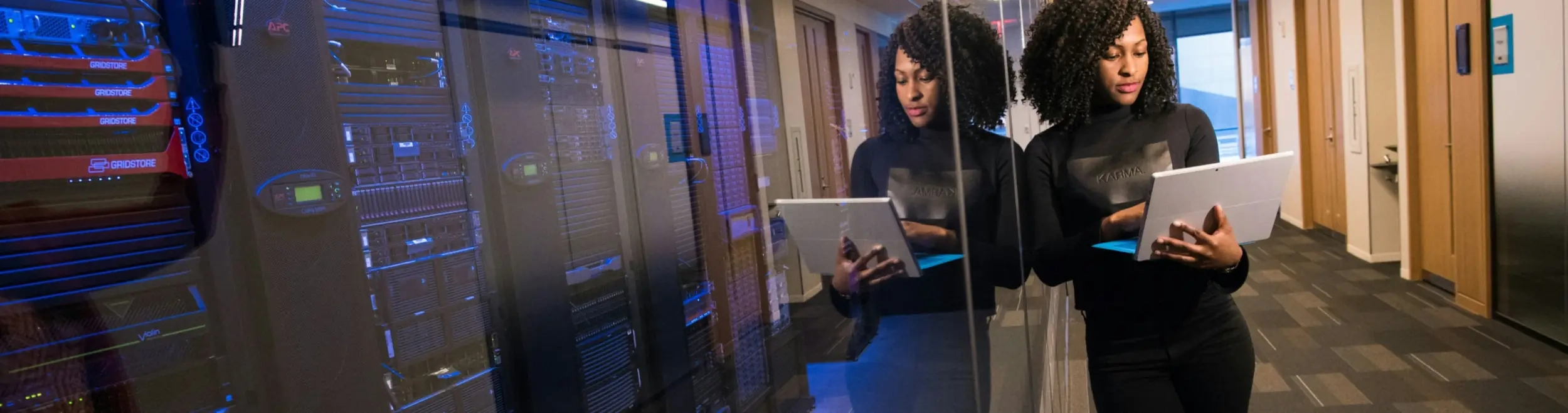 Person with Laptop in Datacenter